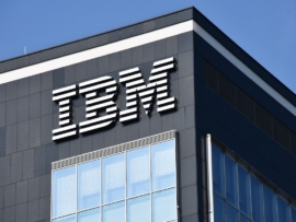 This picture shows a corner perspective of a building at IBM with the IBM logo.